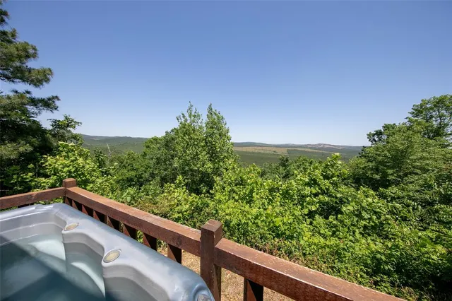 a view of a balcony with an outdoor space