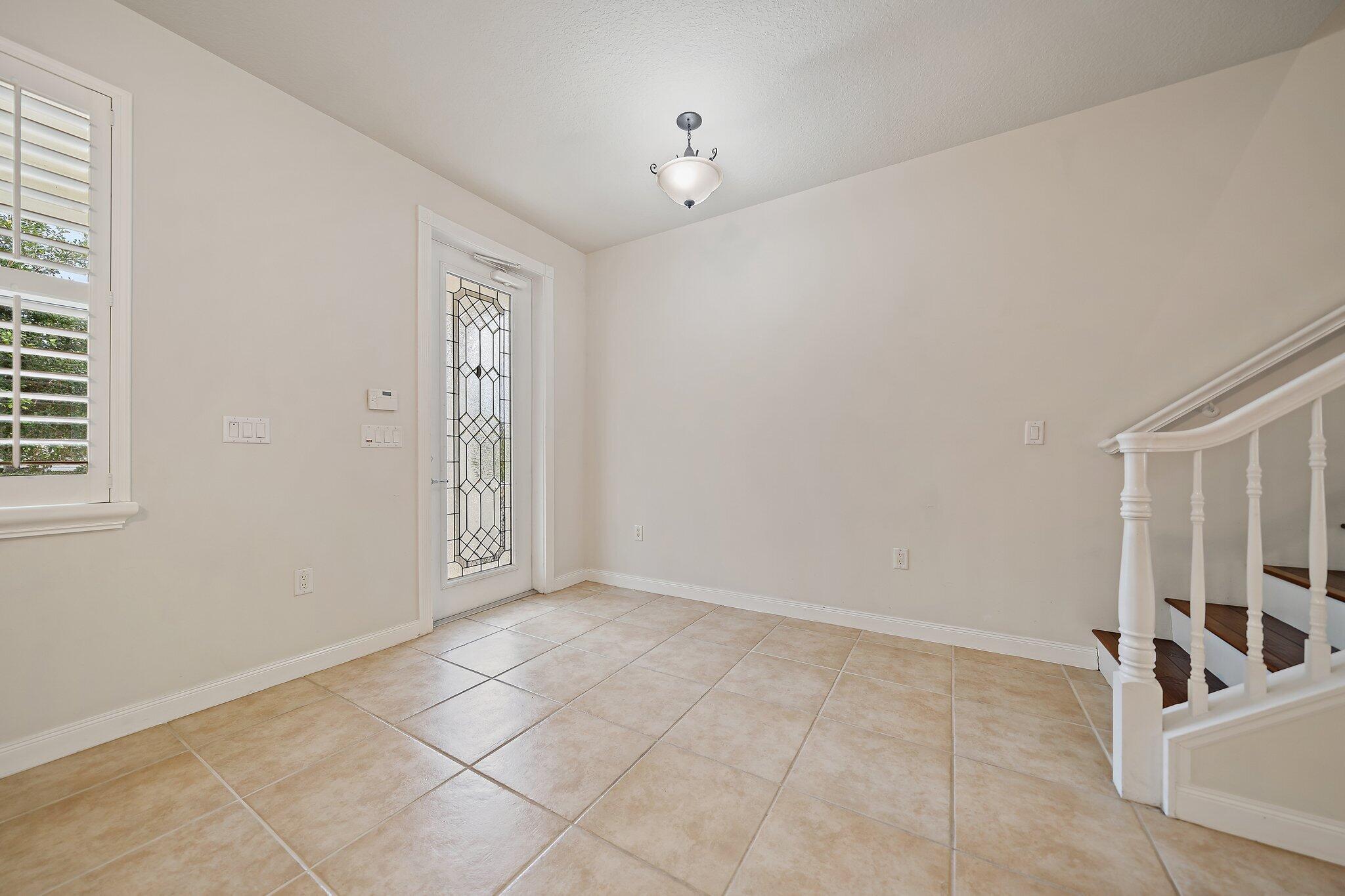 3253 Duncombe Drive Jupiter, FL 33458 - Photo 4 of 33 a view of an empty room