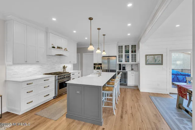 a bedroom with a bed and a table