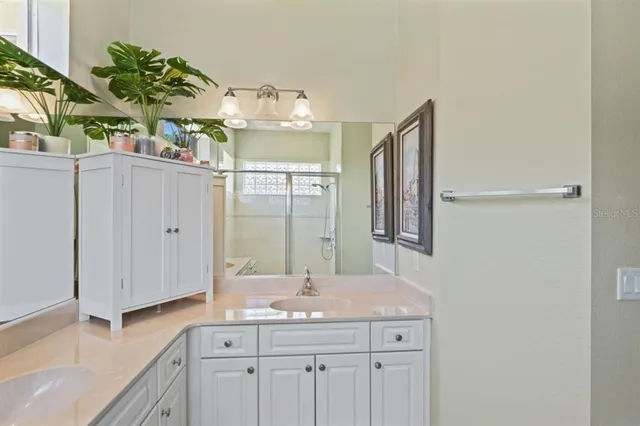 a view of storage and utility room with washer and dryer