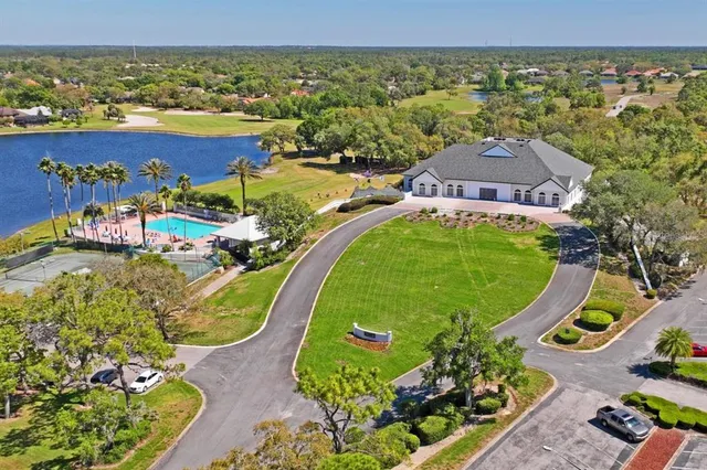 an aerial view of a house with outdoor space