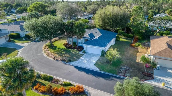 an aerial view of a house with a garden