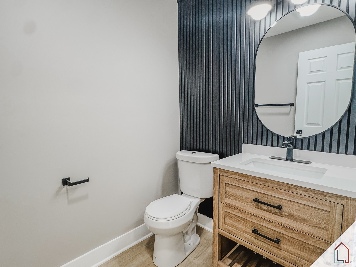 50 Willow Road Matteson, IL 60443 - Photo 16 of 23 a bathroom with a sink a toilet and a mirror
