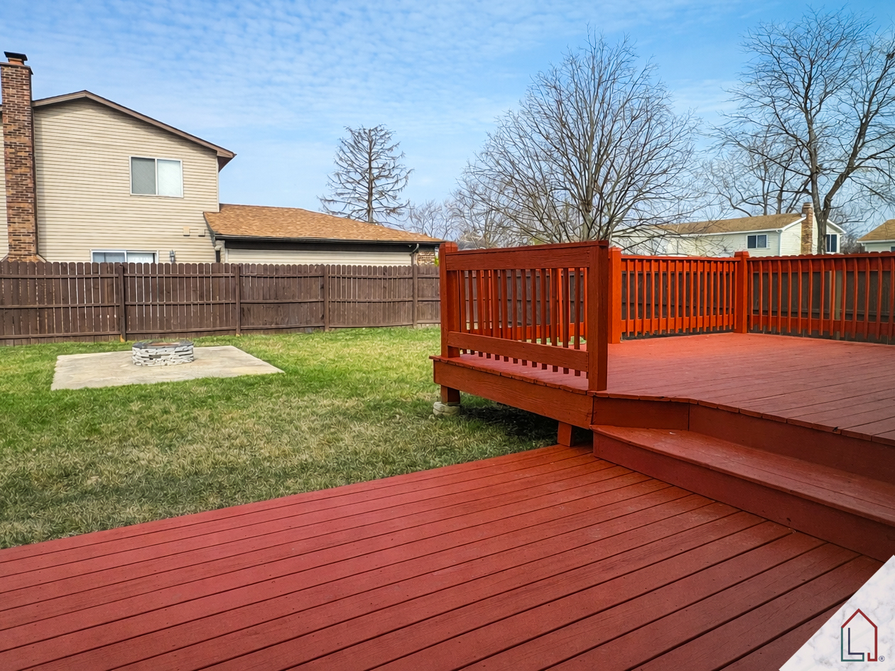 50 Willow Road Matteson, IL 60443 - Photo 17 of 23 a view of a deck with a yard