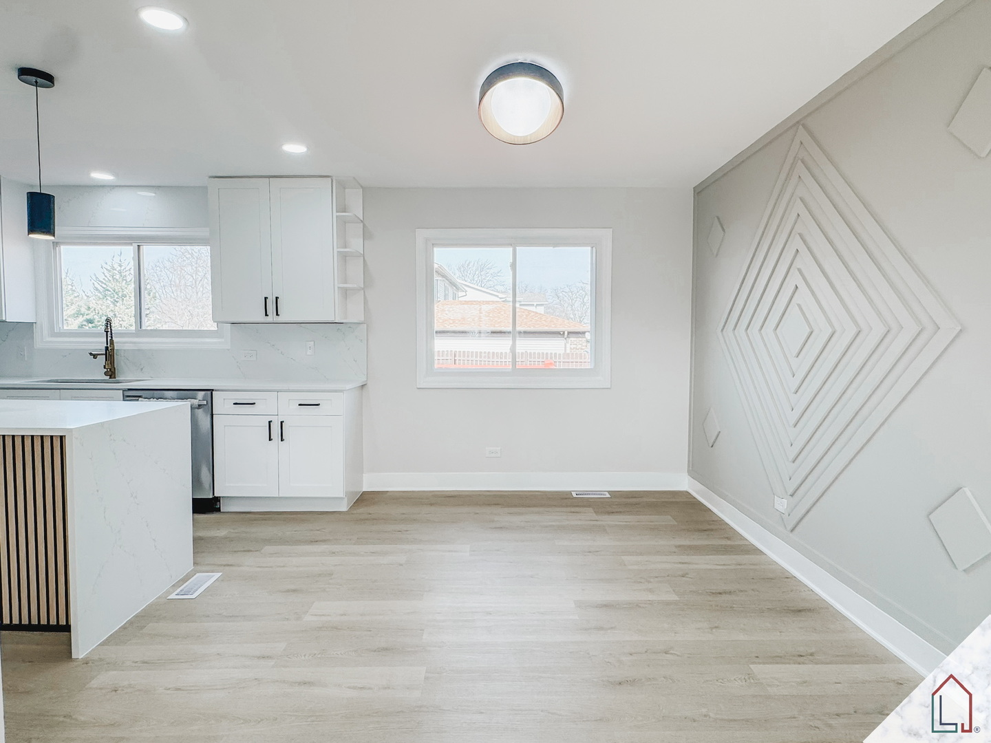 50 Willow Road Matteson, IL 60443 - Photo 7 of 23 an empty room with wooden floor and windows
