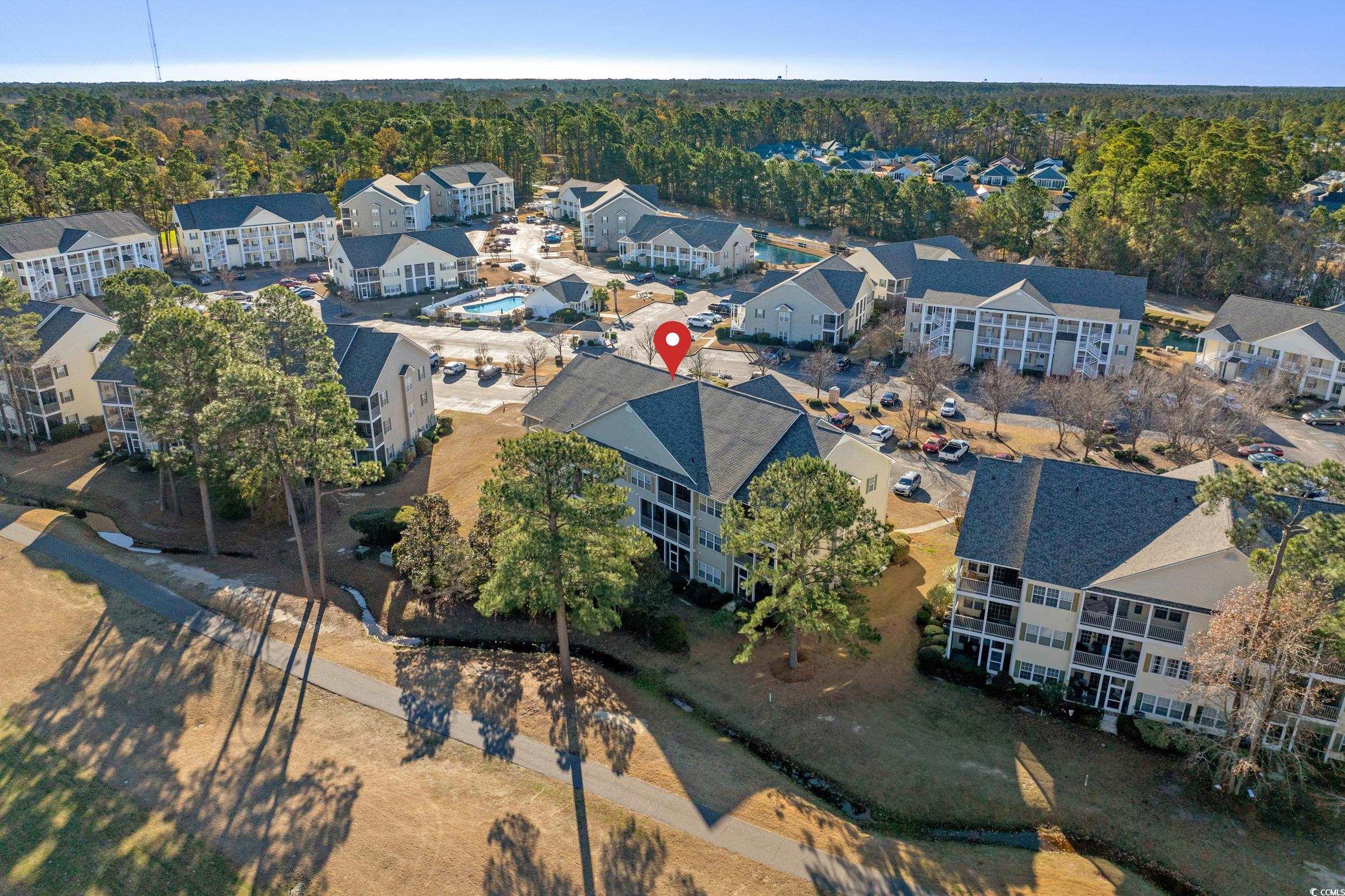 5852 Longwood Drive, Unit 301 Murrells Inlet, SC 29576 - Photo 33 of 35 Aerial overview of property's location featuring nearby suburban area