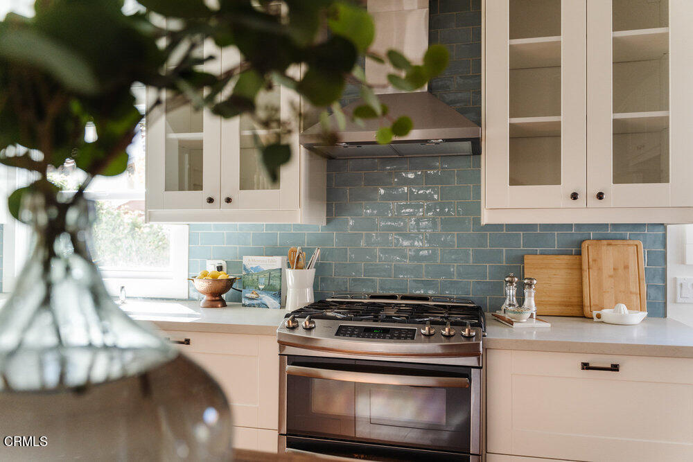 2089 Mar Vista Avenue Altadena, CA 91001 - Photo 13 of 32 a kitchen with a stove and cabinets