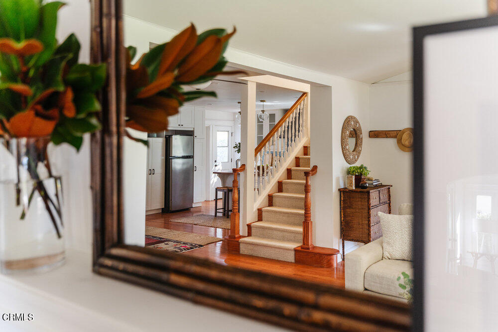 2089 Mar Vista Avenue Altadena, CA 91001 - Photo 19 of 32 a view of entryway and hall with wooden floor