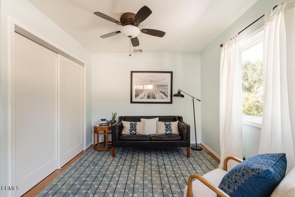 2089 Mar Vista Avenue Altadena, CA 91001 - Photo 23 of 32 a living room with furniture and a rug