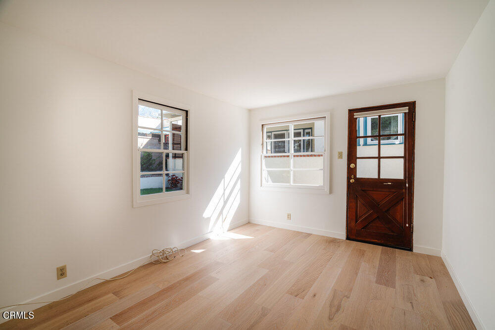 2089 Mar Vista Avenue Altadena, CA 91001 - Photo 30 of 32 a view of an empty room with wooden floor and a window