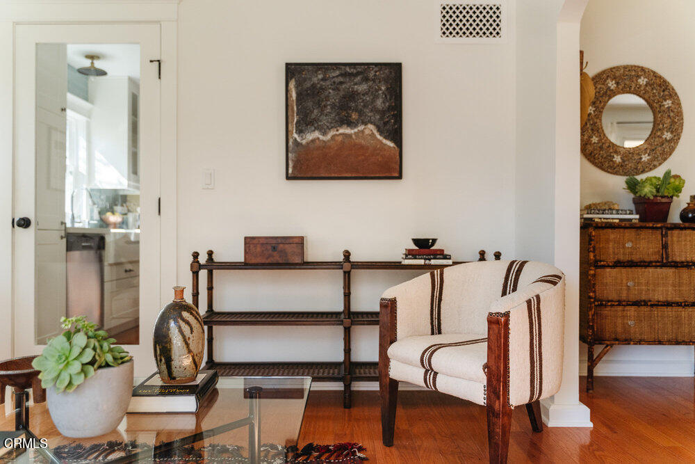 2089 Mar Vista Avenue Altadena, CA 91001 - Photo 9 of 32 a view of a workspace with furniture and wooden floor