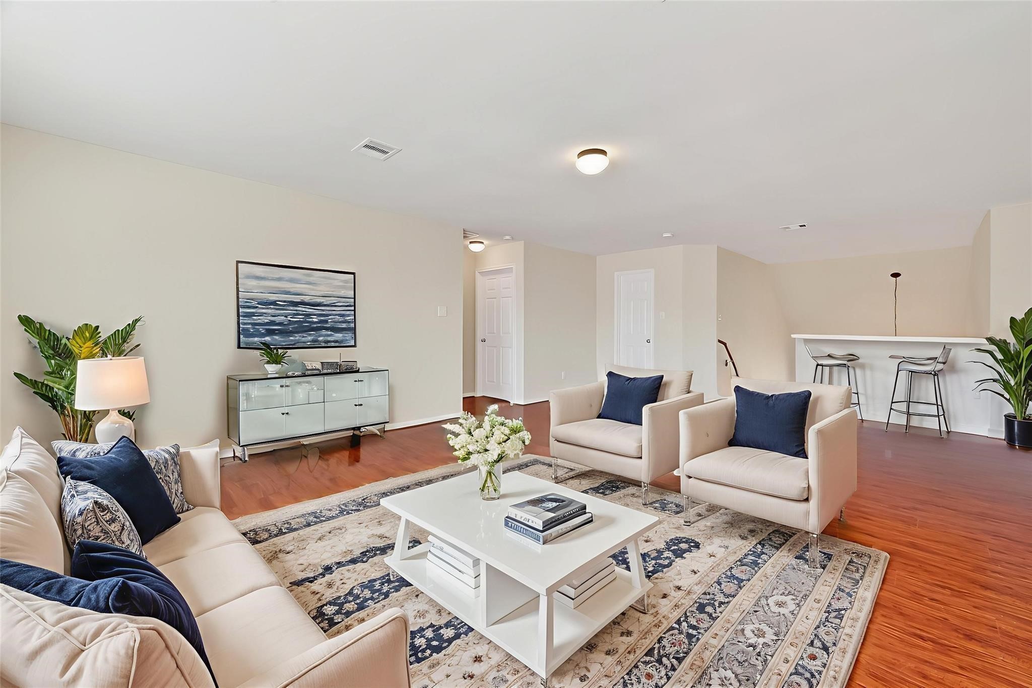 21623 Mid Peak Way Katy, TX 77449 - Photo 22 of 38 a living room with furniture a rug and a table