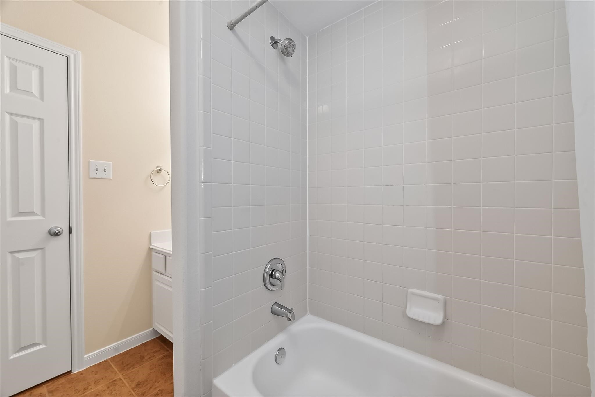 21623 Mid Peak Way Katy, TX 77449 - Photo 27 of 38 a bathroom with a white bath tub and a shower