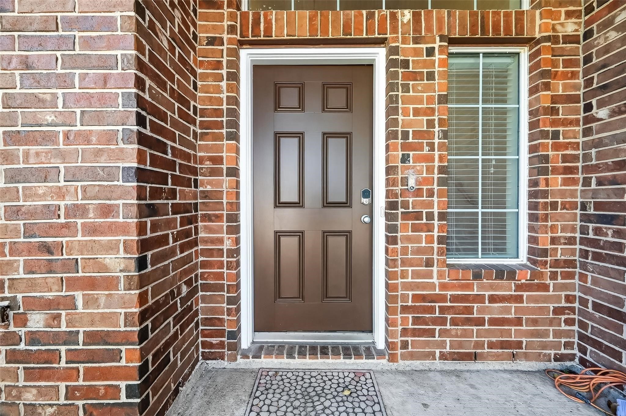 21623 Mid Peak Way Katy, TX 77449 - Photo 3 of 38 a view of a brick building with many windows