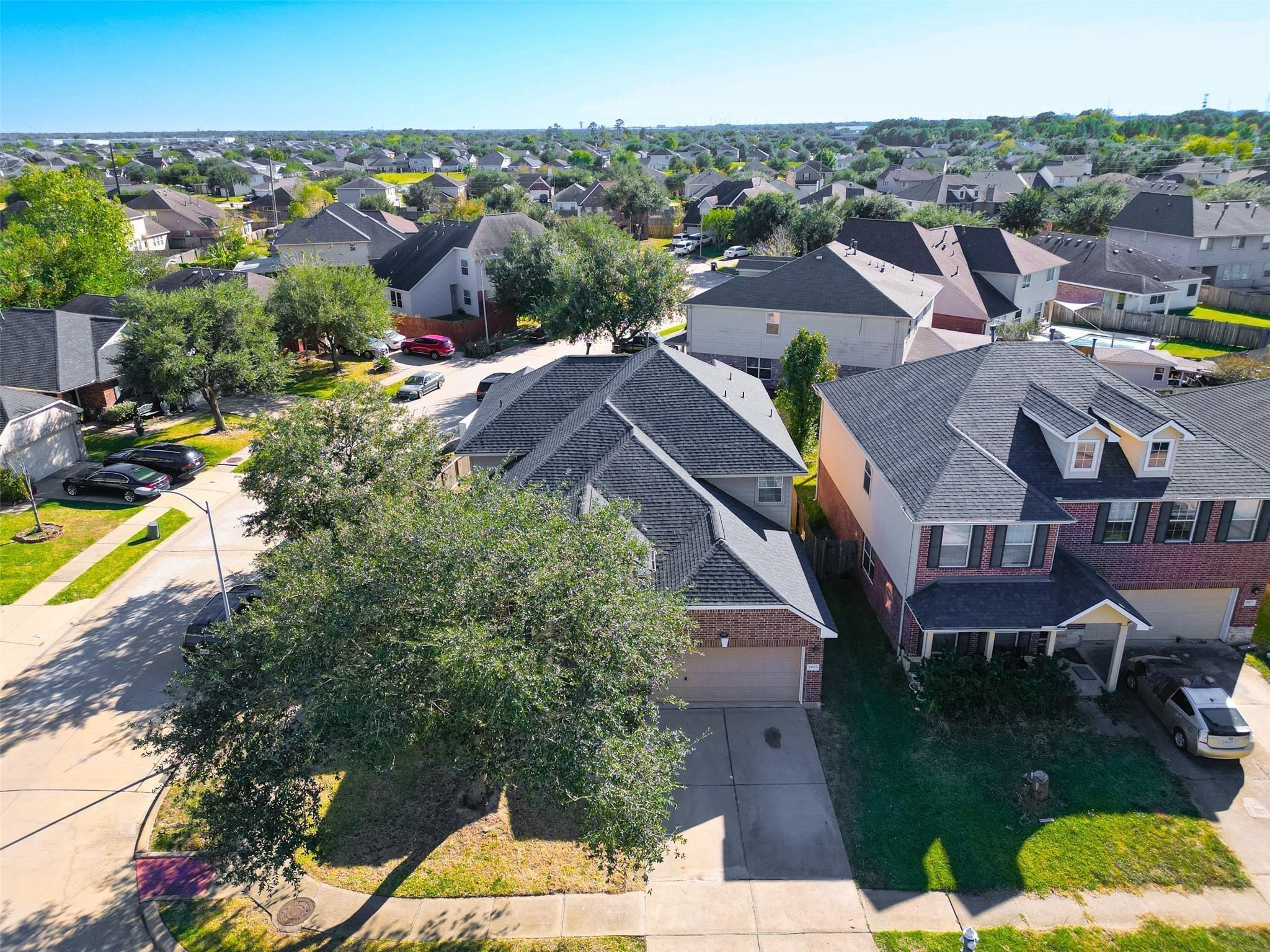 21623 Mid Peak Way Katy, TX 77449 - Photo 32 of 38 an aerial view of multiple houses with yard