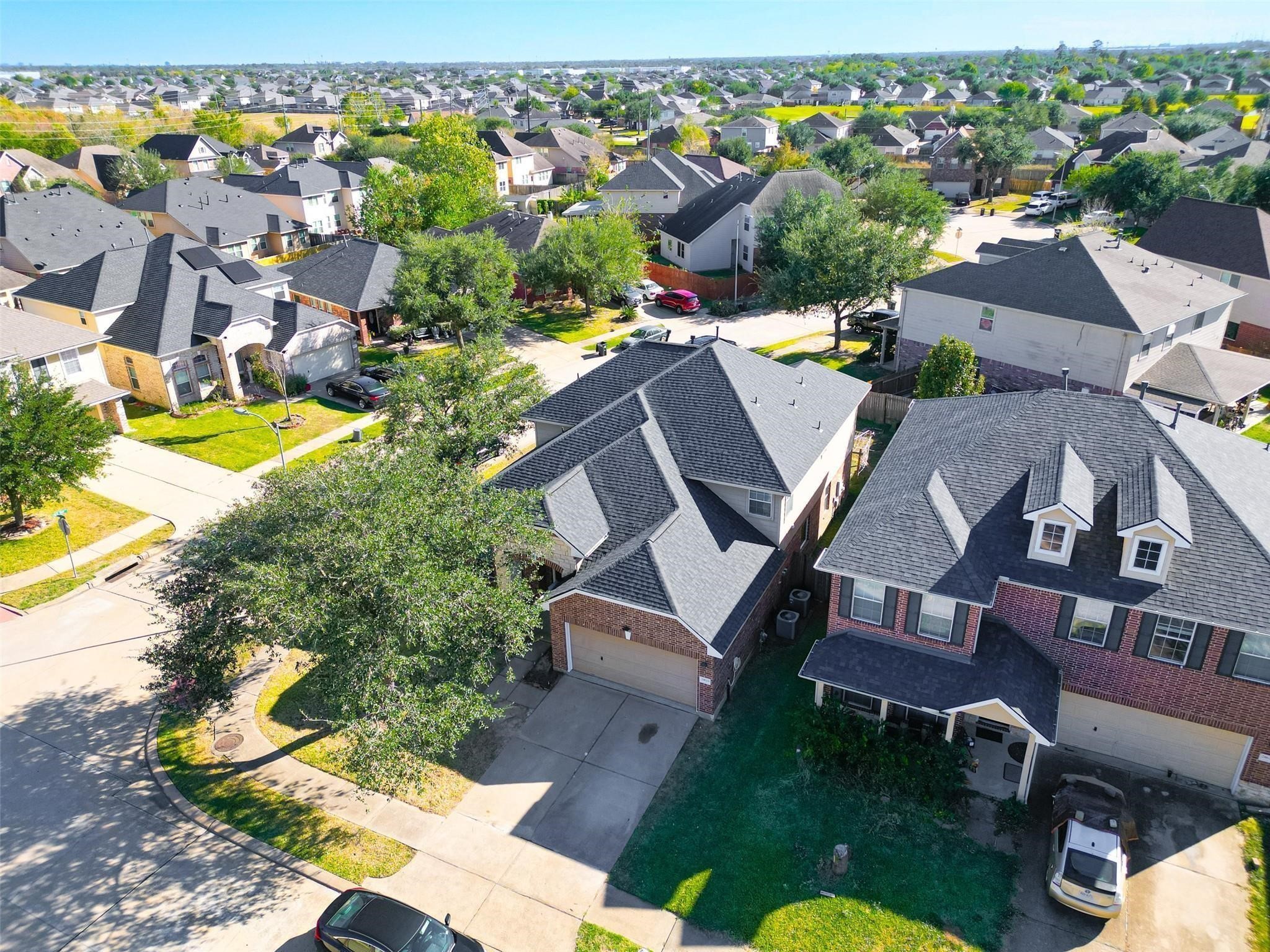 21623 Mid Peak Way Katy, TX 77449 - Photo 34 of 38 an aerial view of residential houses with outdoor space and swimming pool