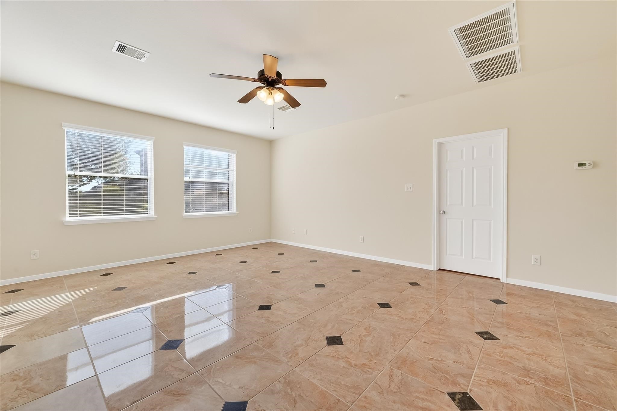 21623 Mid Peak Way Katy, TX 77449 - Photo 10 of 38 a view of an empty room with a window