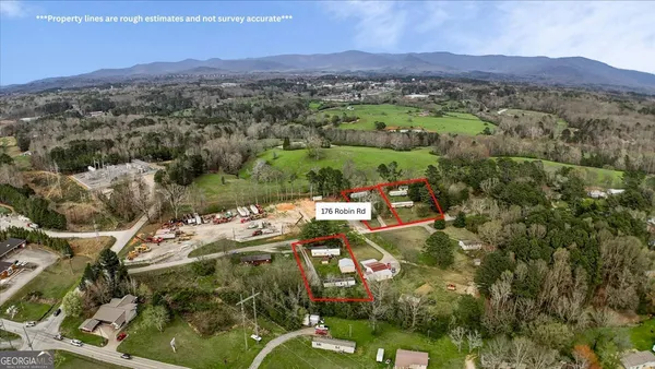 a aerial view of a house with a garden