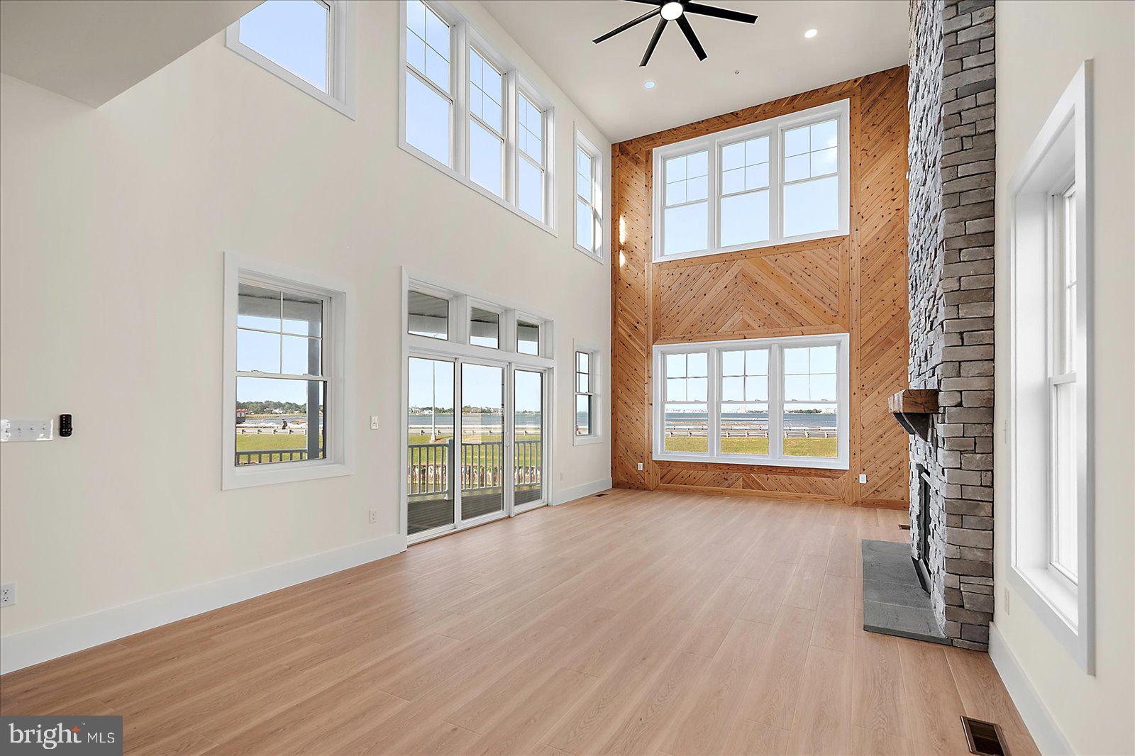 12971 Inlet Isle Lane Ocean City, MD 21842 - Photo 23 of 135 Two story family room with ceiling fan