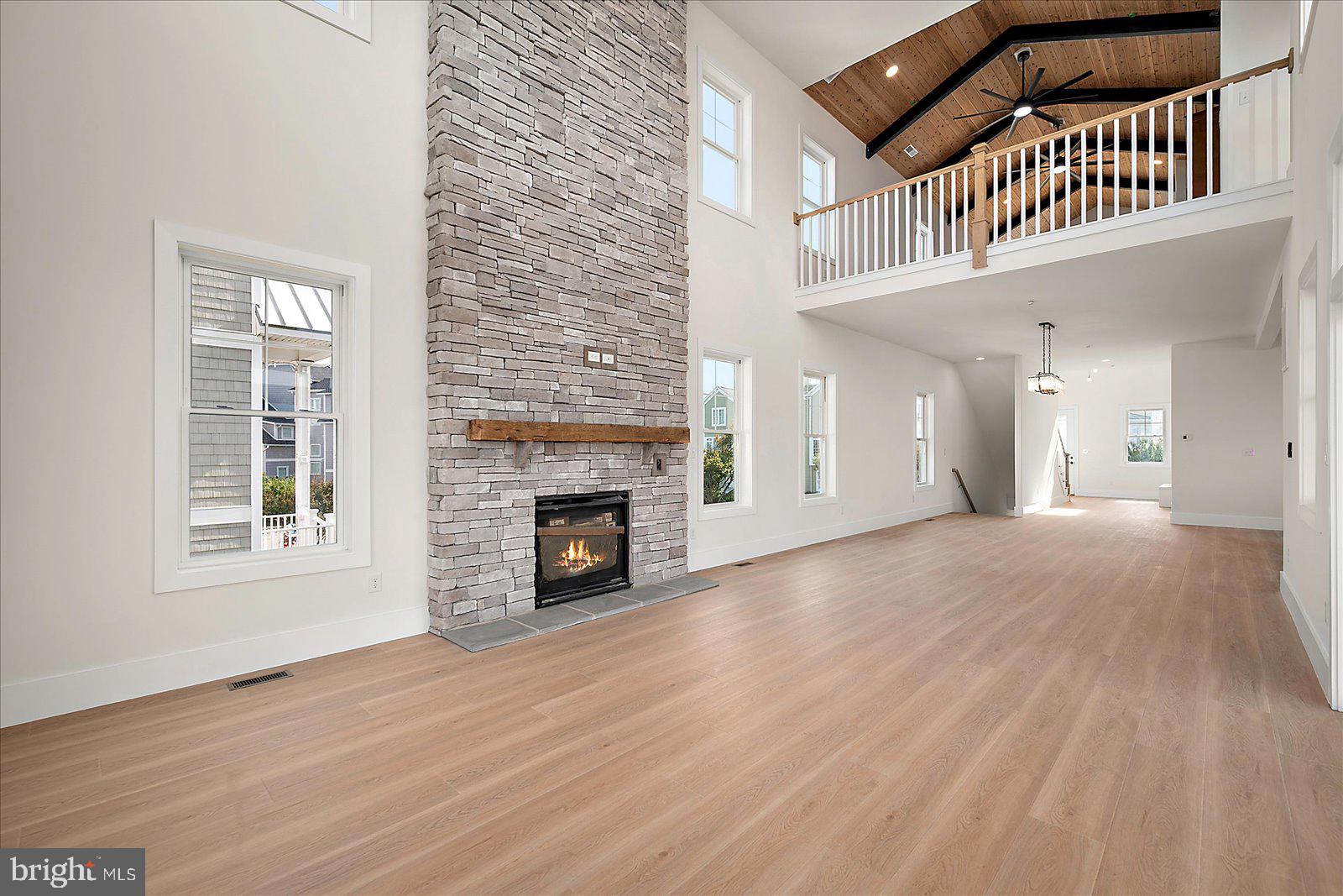 12971 Inlet Isle Lane Ocean City, MD 21842 - Photo 28 of 135 Spacious family room with cozy gas fireplace