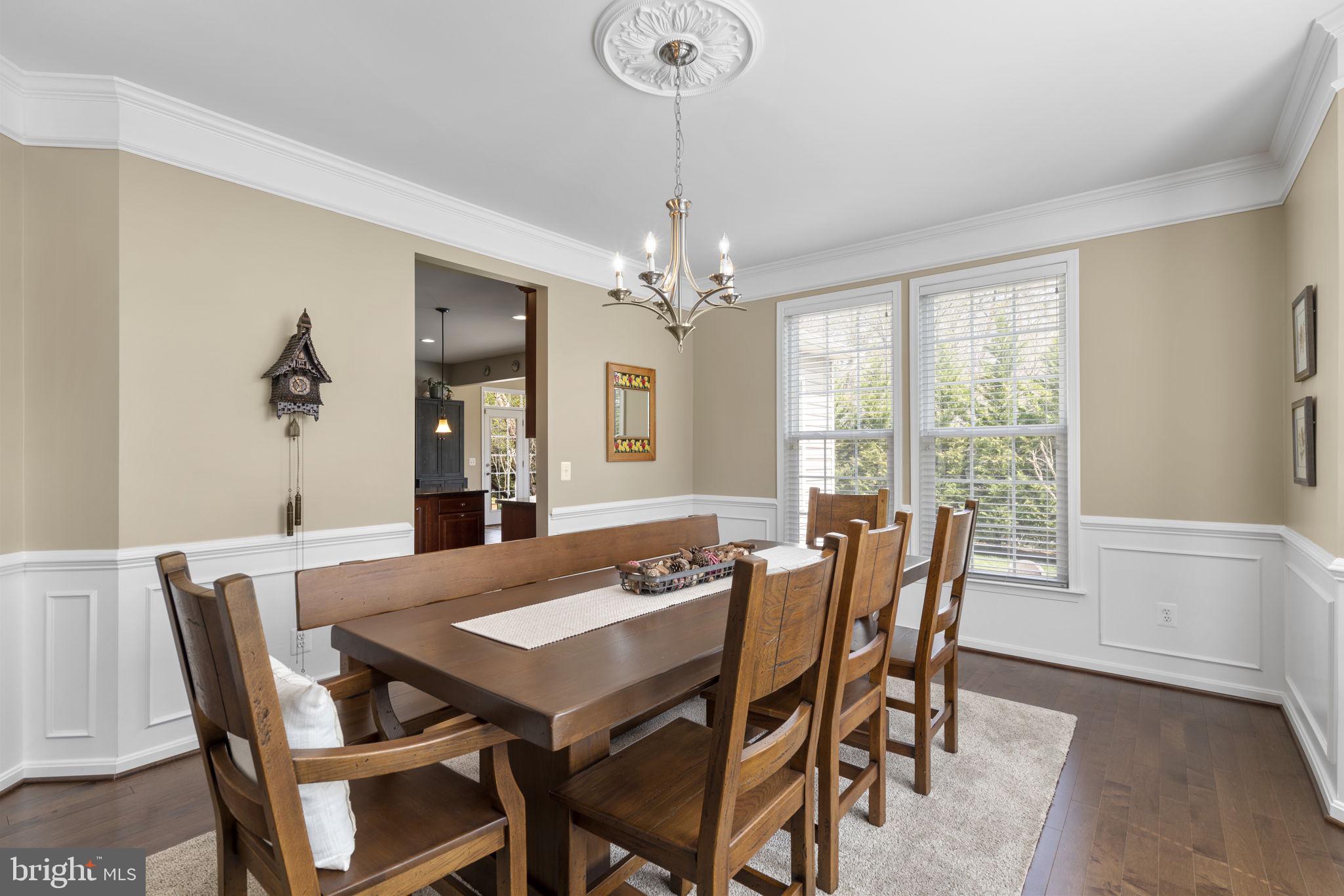 9323 Castle Hill Road Springfield, VA 22153 - Photo 14 of 95 a view of a dining room with furniture window and wooden floor