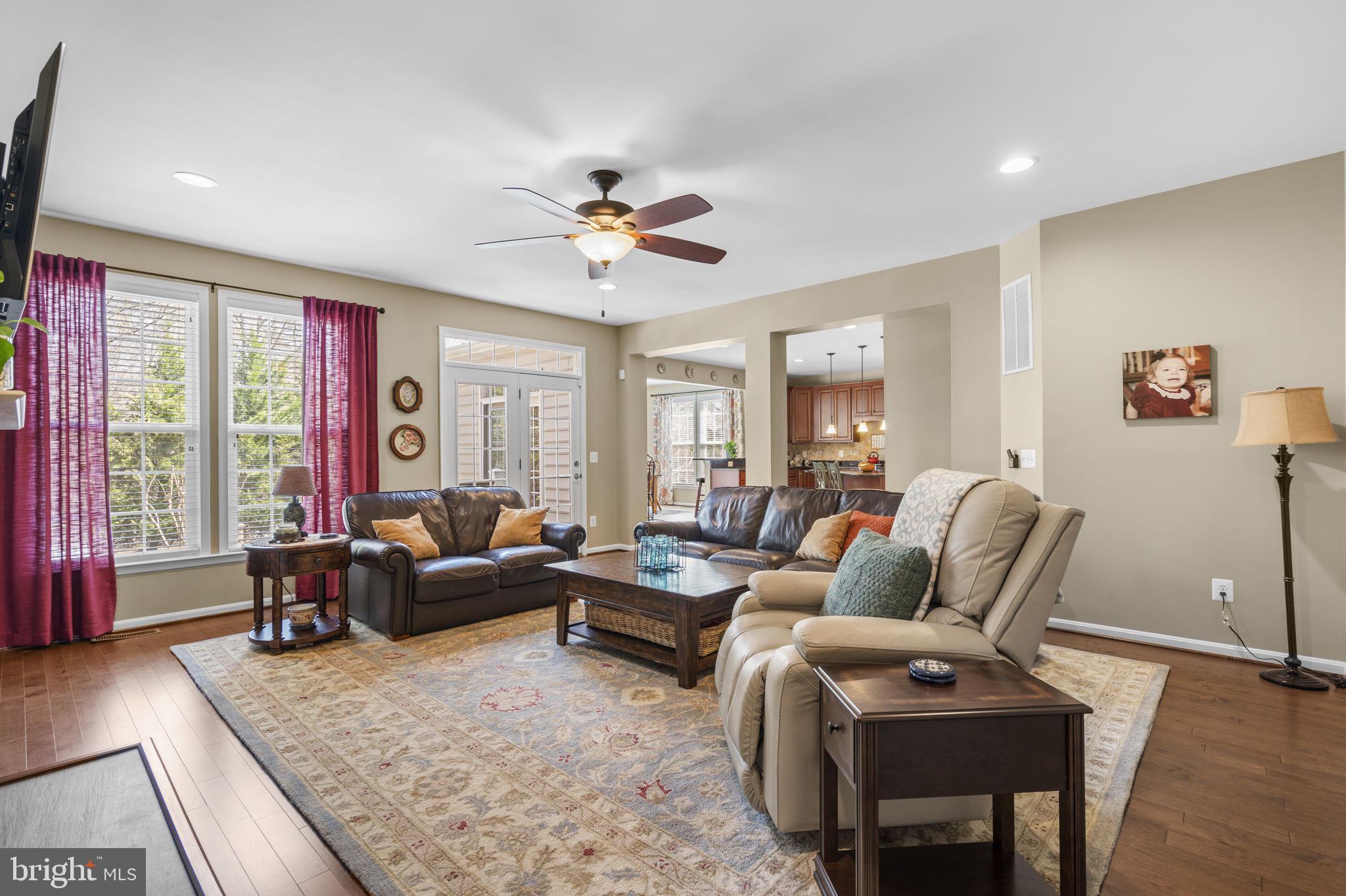 9323 Castle Hill Road Springfield, VA 22153 - Photo 29 of 95 a living room with furniture and a large window
