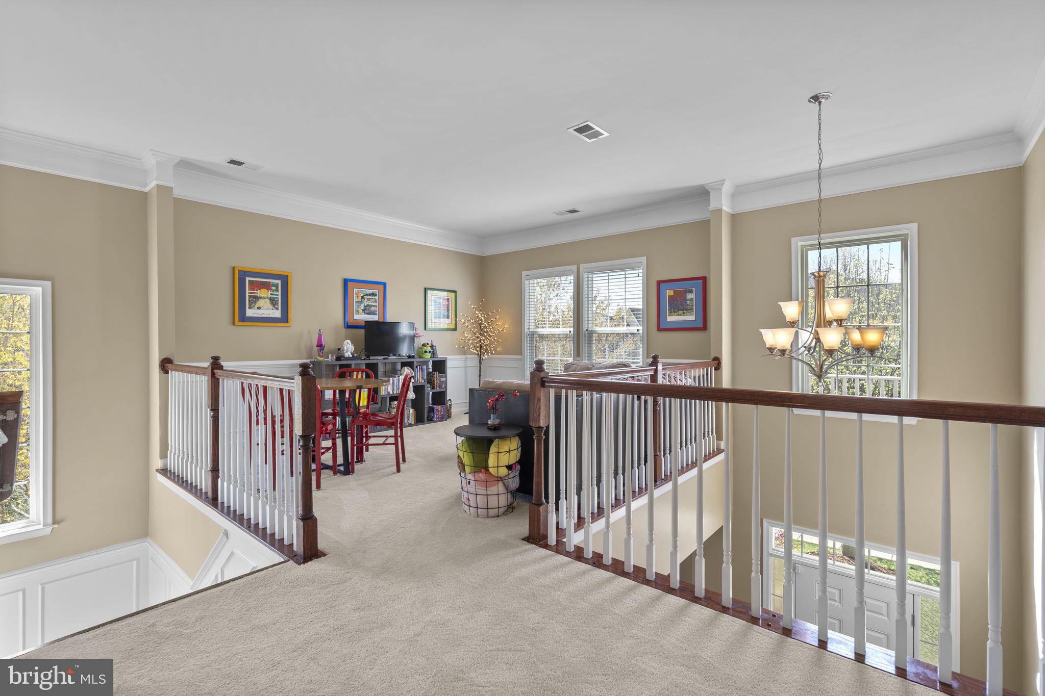 9323 Castle Hill Road Springfield, VA 22153 - Photo 32 of 95 a view of a livingroom with furniture and windows
