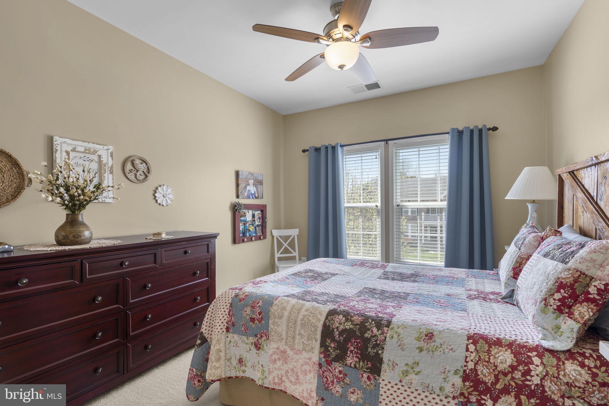 9323 Castle Hill Road Springfield, VA 22153 - Photo 46 of 95 a bedroom with a bed and a window