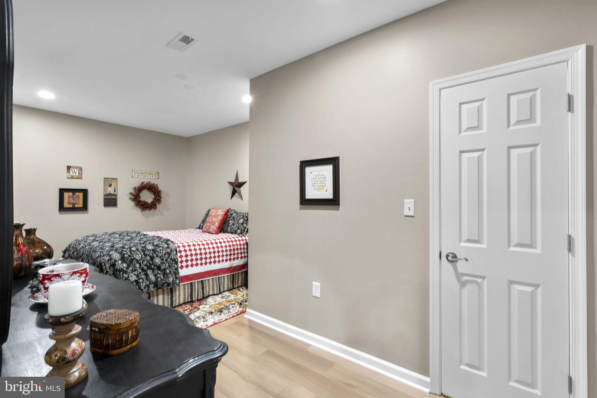 9323 Castle Hill Road Springfield, VA 22153 - Photo 61 of 95 a living room with furniture and a window
