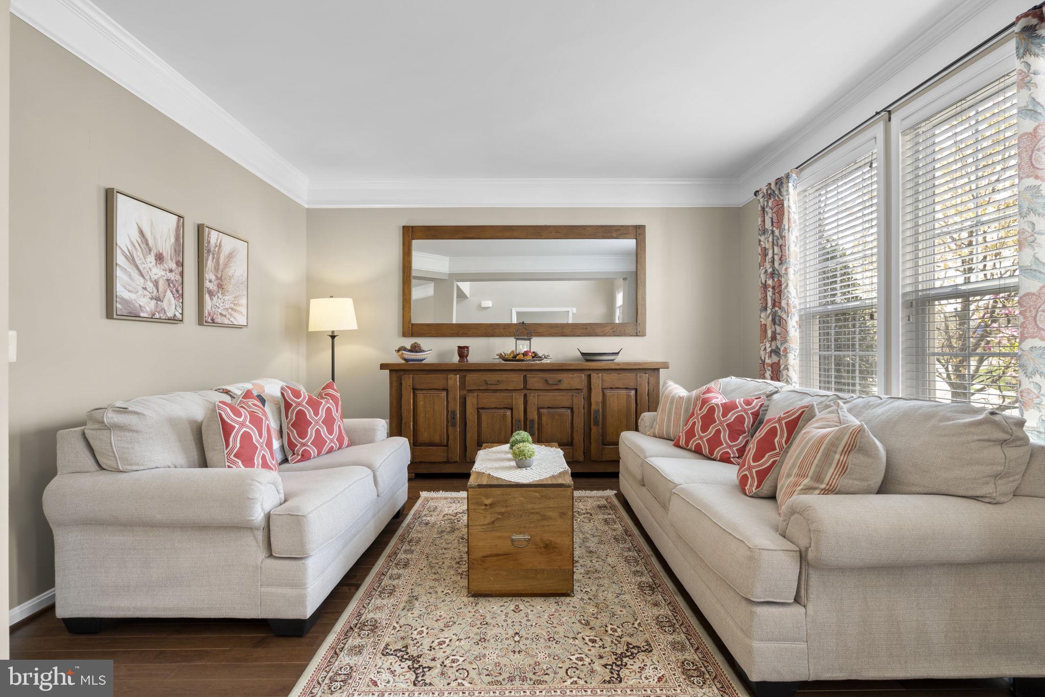 9323 Castle Hill Road Springfield, VA 22153 - Photo 9 of 95 a living room with furniture and a large window
