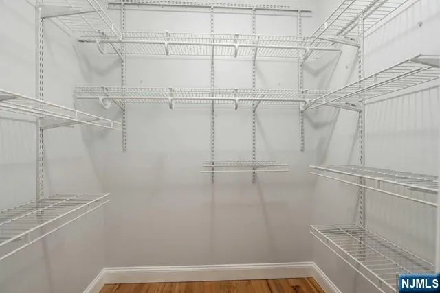 a spacious bathroom with a double vanity sink mirror and