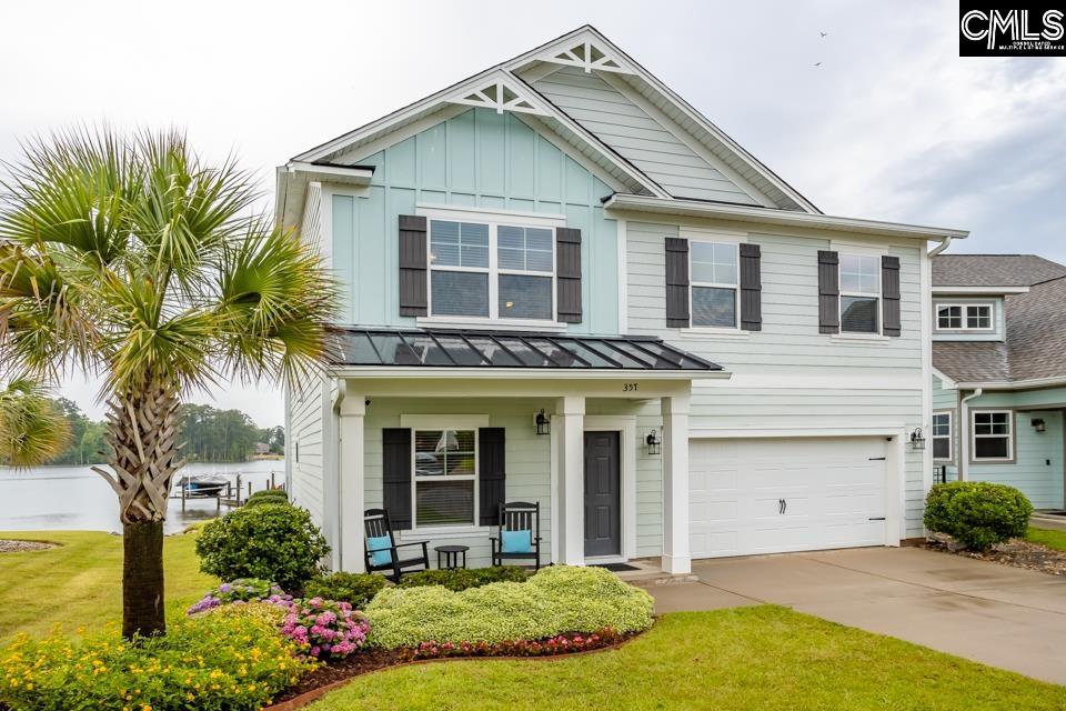 357 Cabana Way Lexington, SC 29072 - Photo 4 of 25 a front view of a house with a garden and plants