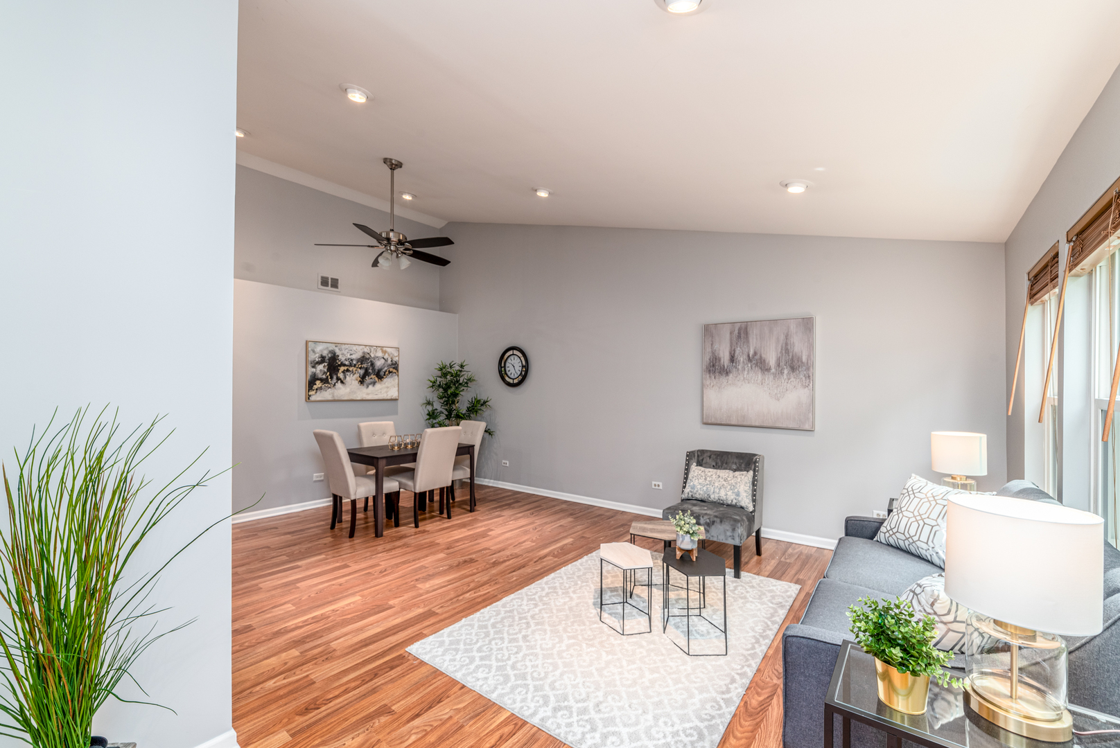 350 Chaparral Circle Elgin, IL 60120 - Photo 11 of 28 a dining room with furniture potted plants and wooden floor