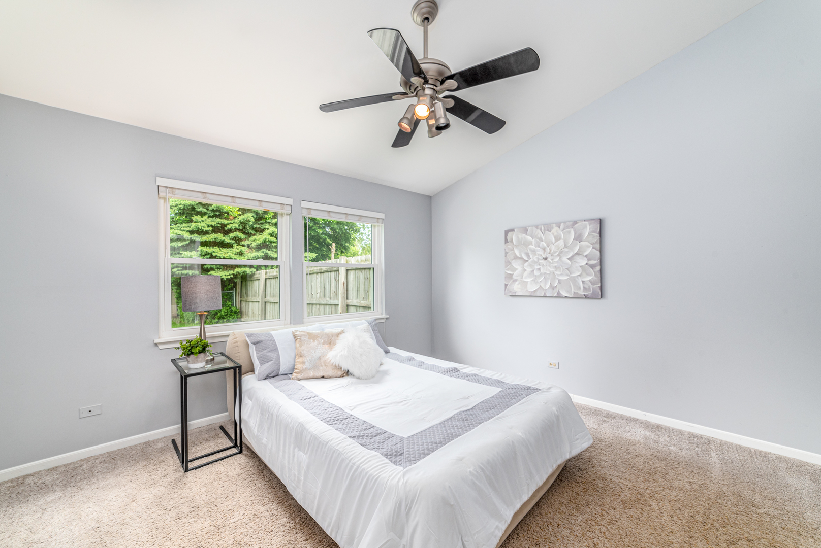 350 Chaparral Circle Elgin, IL 60120 - Photo 17 of 28 a bedroom with a bed and a window
