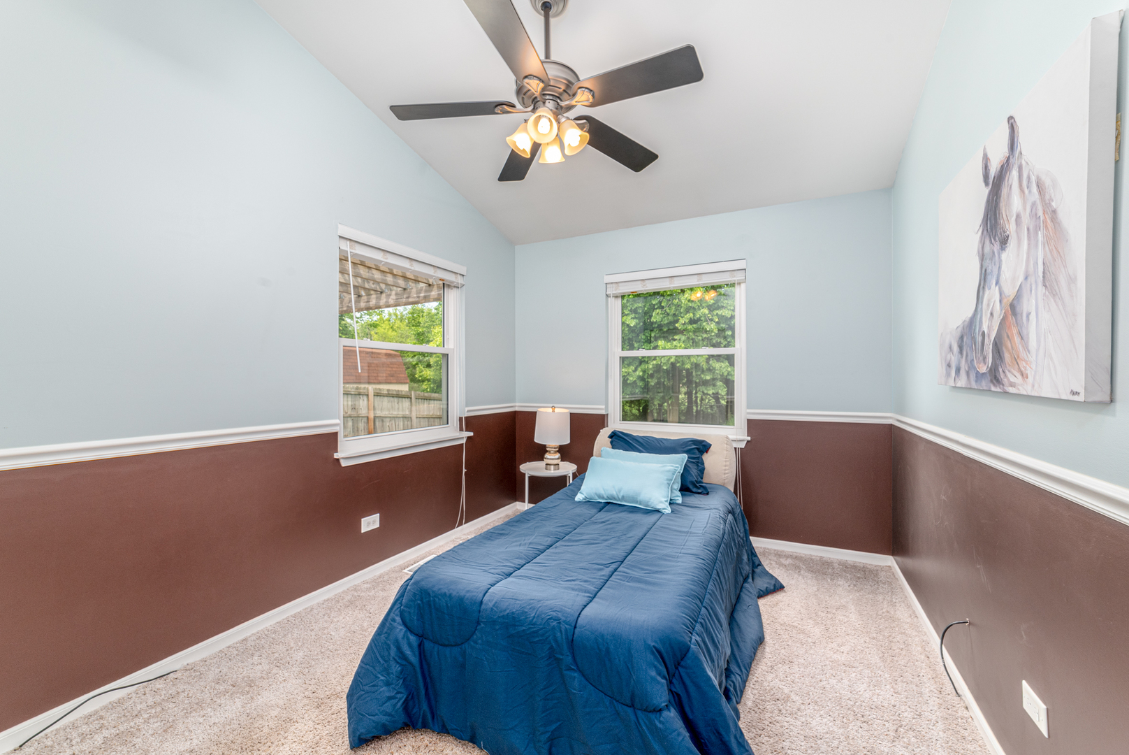 350 Chaparral Circle Elgin, IL 60120 - Photo 18 of 28 a bedroom with a bed and window with lamp