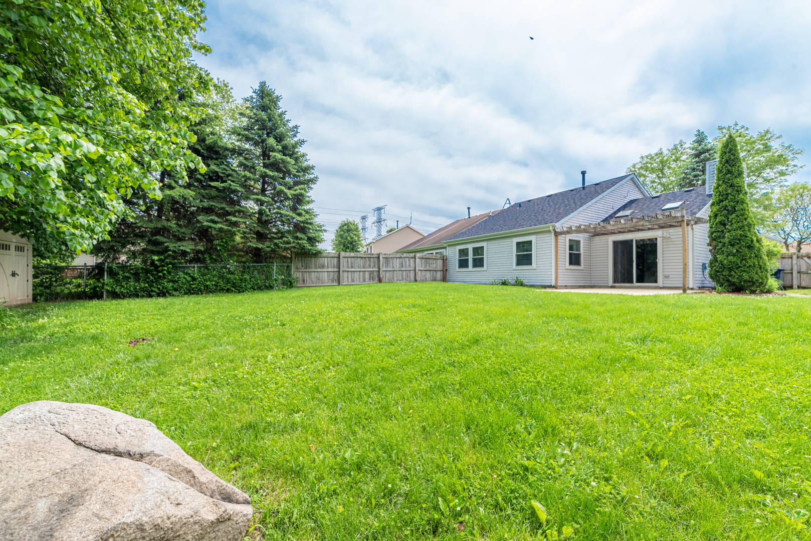350 Chaparral Circle Elgin, IL 60120 - Photo 23 of 28 a view of house that has a yard