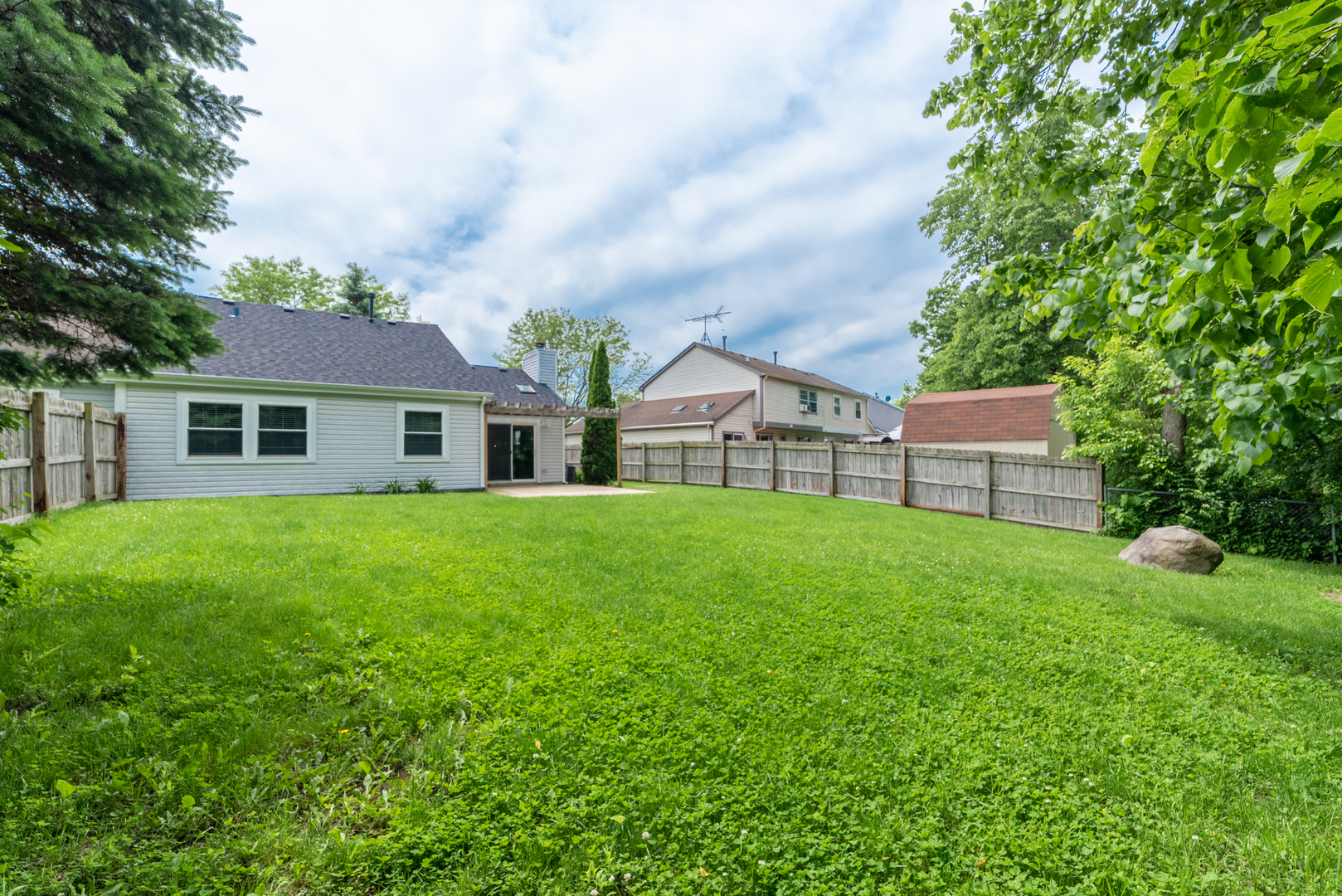 350 Chaparral Circle Elgin, IL 60120 - Photo 24 of 28 a view of a house with backyard and garden