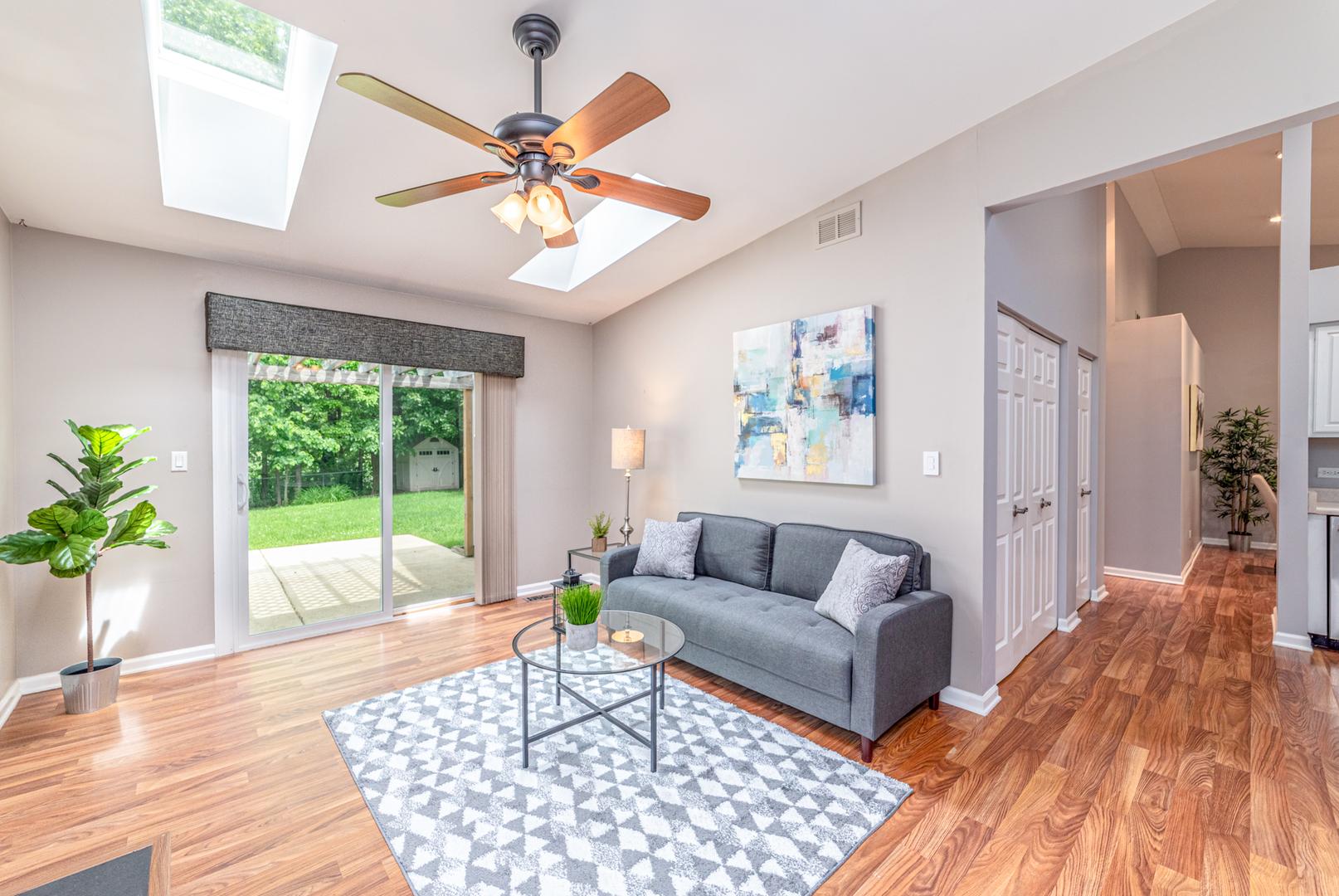350 Chaparral Circle Elgin, IL 60120 - Photo 8 of 28 a living room with furniture and a large window with wooden floor