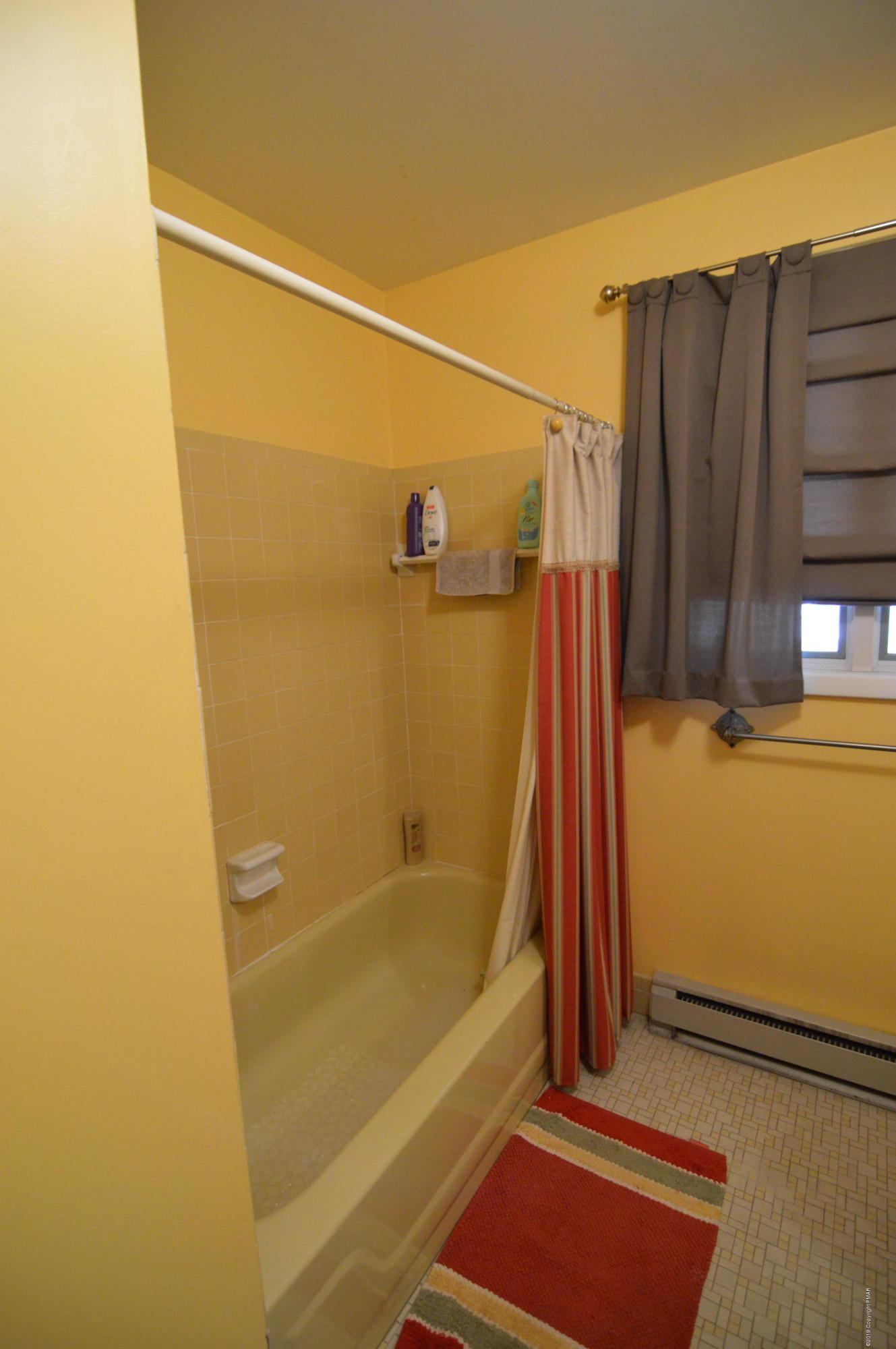 139 Maple Road Blakeslee, PA 18610 - Photo 14 of 29 a bathroom with a shower and a tub