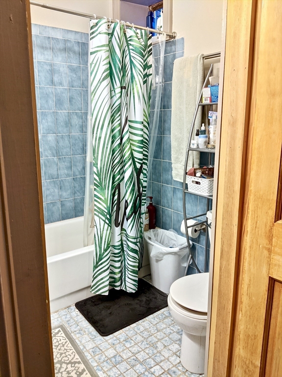 616 Columbus Avenue, Unit 7 Boston, MA 02118 - Photo 14 of 25 a bathroom with a sink a toilet and tub