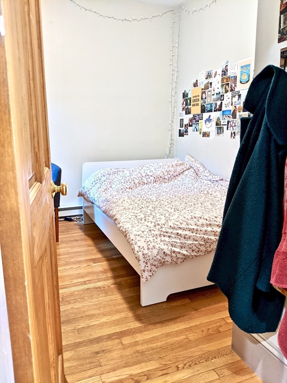 616 Columbus Avenue, Unit 7 Boston, MA 02118 - Photo 24 of 25 a bedroom with a bed and a window