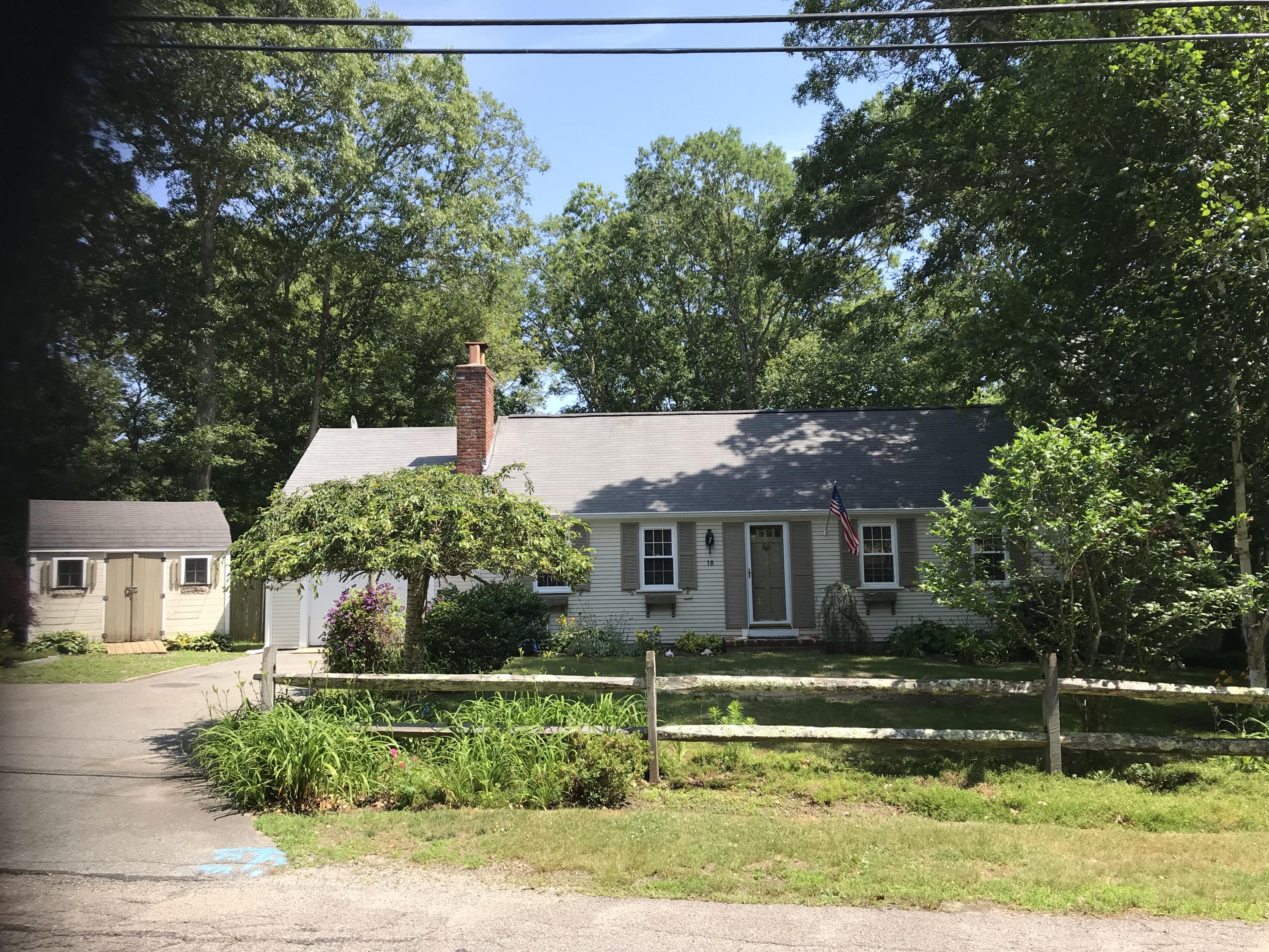 18 Stoney Cliff Road Centerville, MA 02632 - Photo 1 of 14 a house that has a tree in it