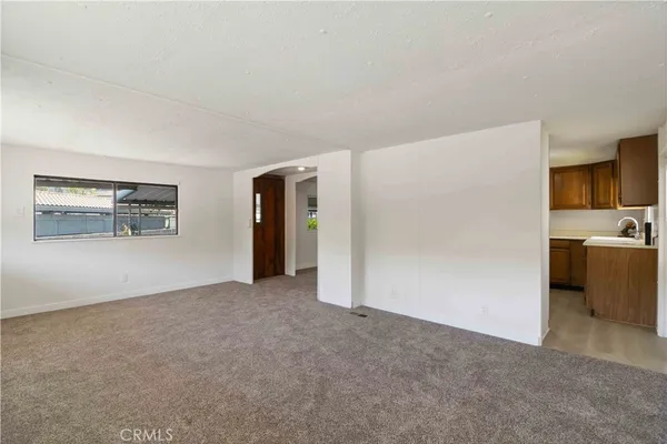 a kitchen with a stove and a sink