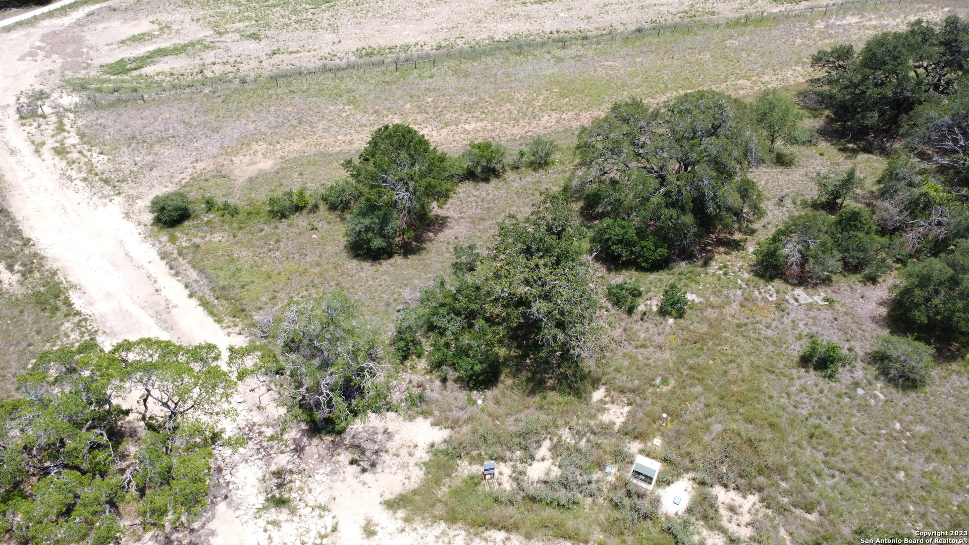 771 Early Rdg Road Bulverde, TX 78163 - Photo 24 of 26 a view of a lake from a yard