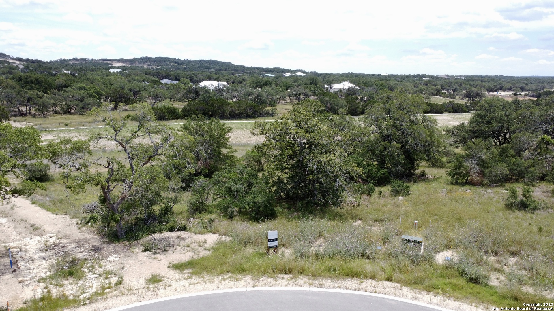 771 Early Rdg Road Bulverde, TX 78163 - Photo 26 of 26 a view of a forest with a street