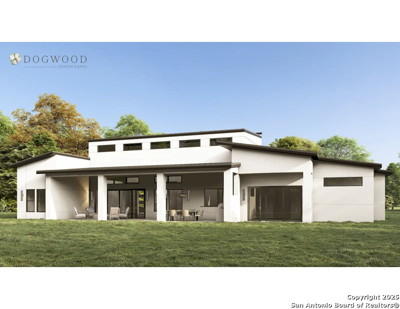 771 Early Rdg Road Bulverde, TX 78163 - Photo 4 of 26 a front view of a house with a garden and trees