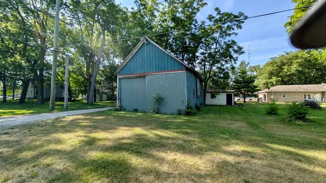 a view of backyard with green space