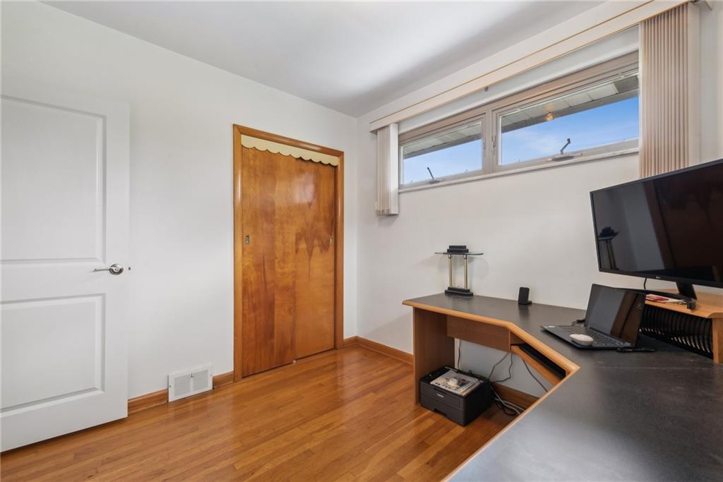 2480 Lynnrose Drive Irwin, PA 15642 - Photo 14 of 39 a living room with furniture and a flat screen tv