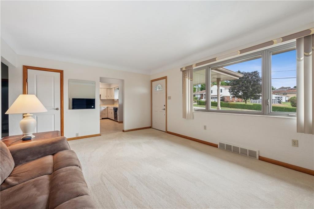 2480 Lynnrose Drive Irwin, PA 15642 - Photo 17 of 39 a living room with furniture and a large window