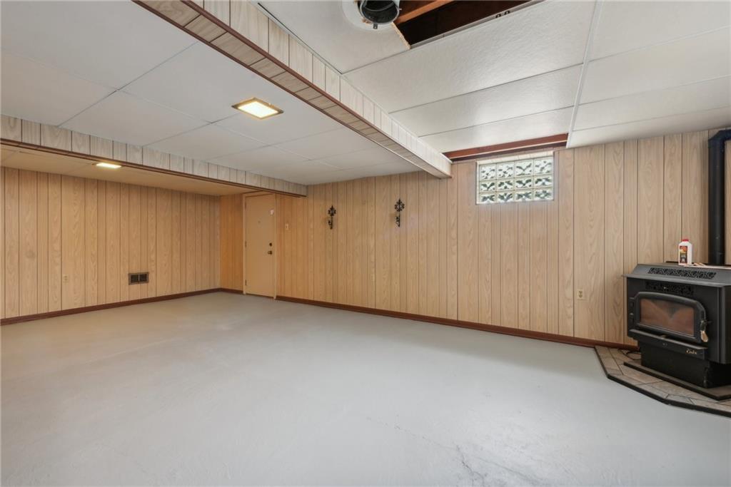2480 Lynnrose Drive Irwin, PA 15642 - Photo 23 of 39 a view of an empty room with a fireplace